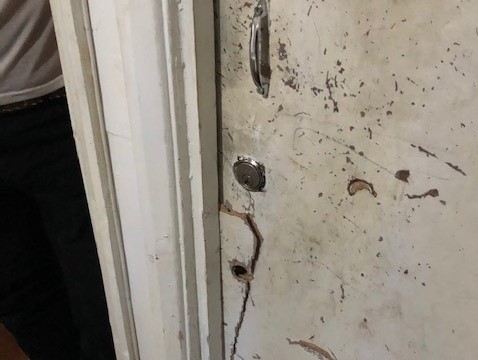 Broken filthy door