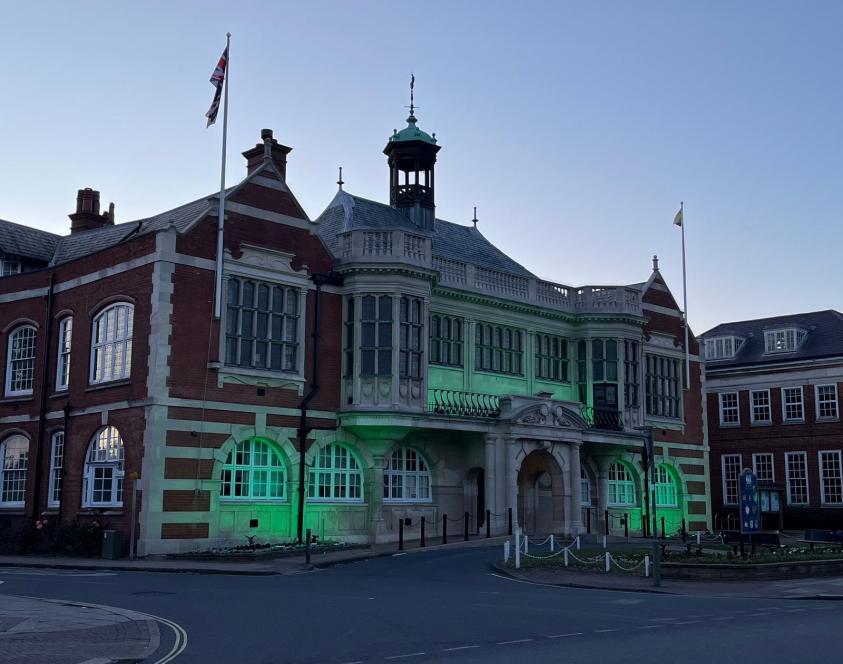 Hendon Town Hall with green lights outside